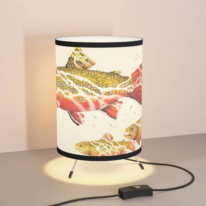 Brook Trout tripod lamp on table